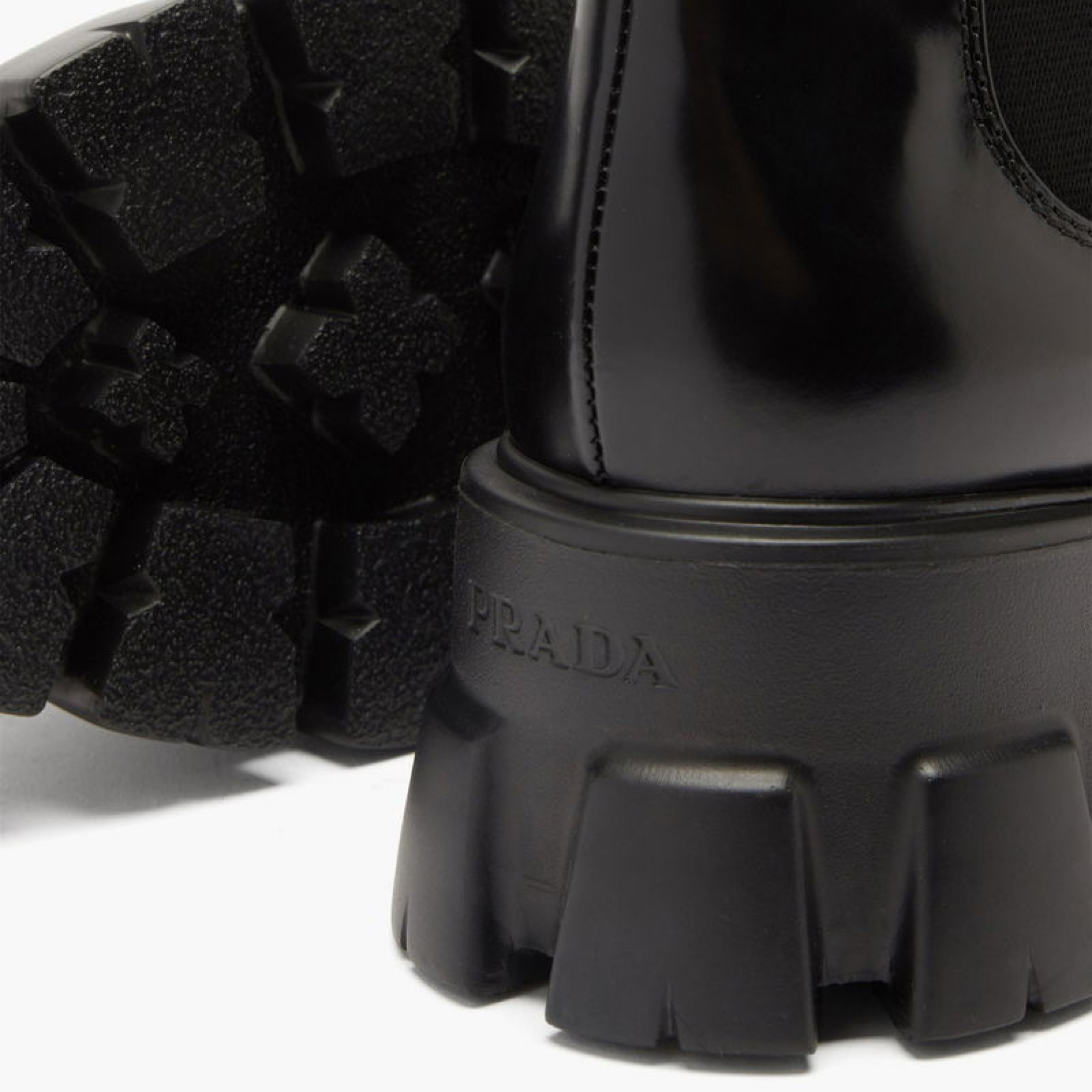Prada Monolith Leather Ankle Boots Close-Up