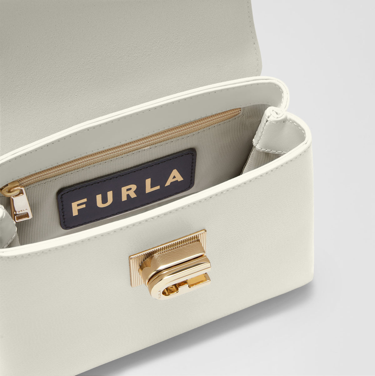 Women’s handbag Furla 1927 Top Handle Mini
SKU: WB00109_ARE000_1007_PNN00 Panna inside view