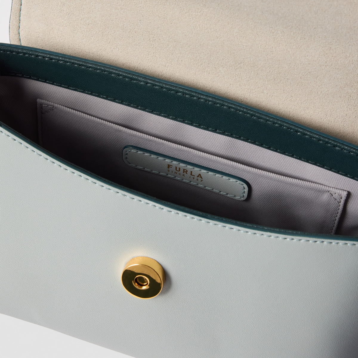 Women’s handbag Furla Moonlight Top Handle
WE00924_BX3175_1002_4958S Toni Edera Green lock view